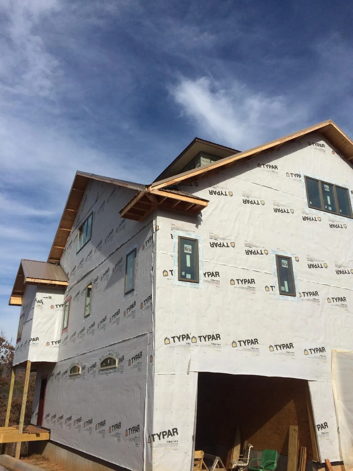 Stick built house wrapped in Typar with new roof framing and dormers in West Shokan